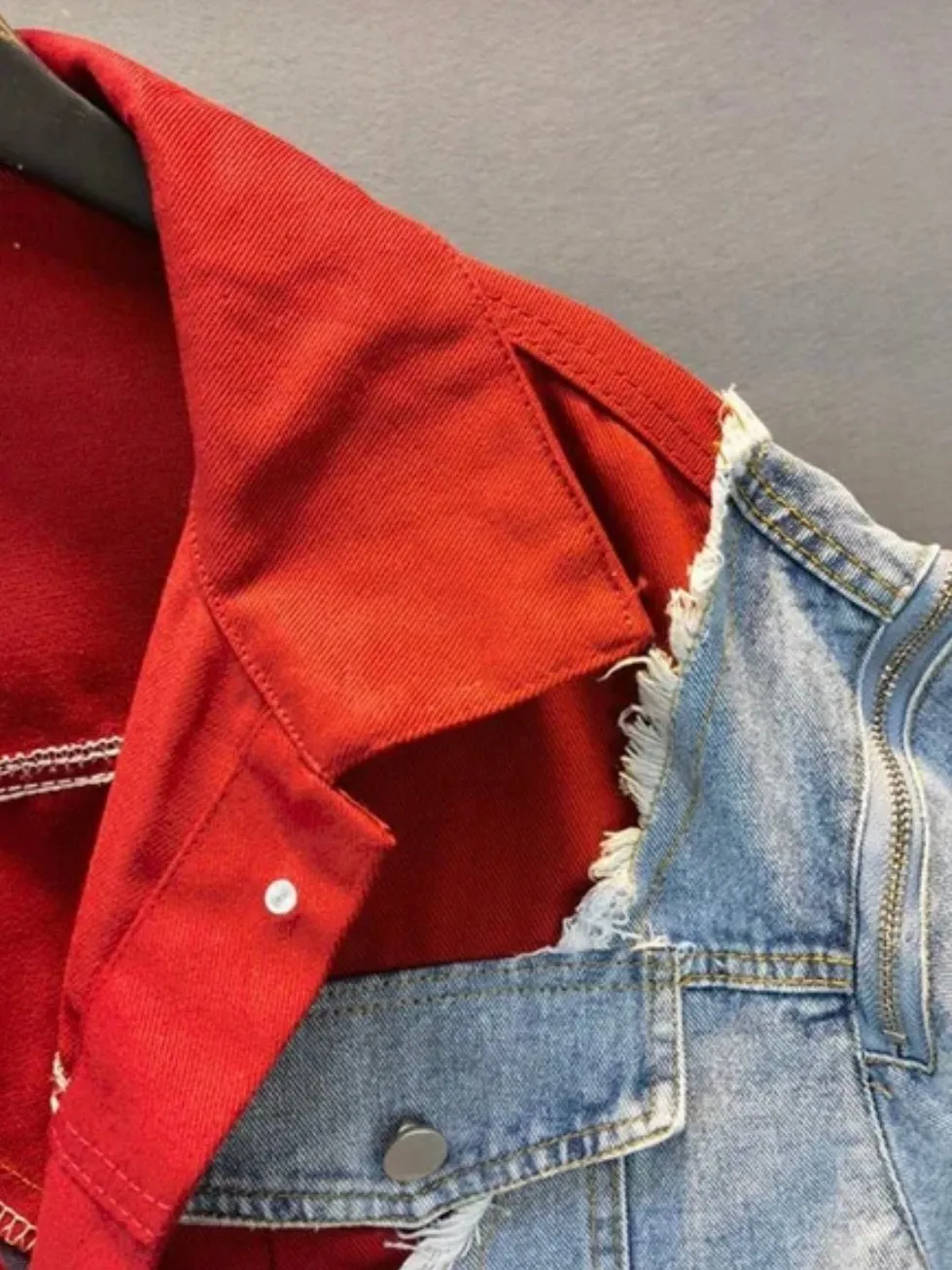 Red and mid blue denim jacket